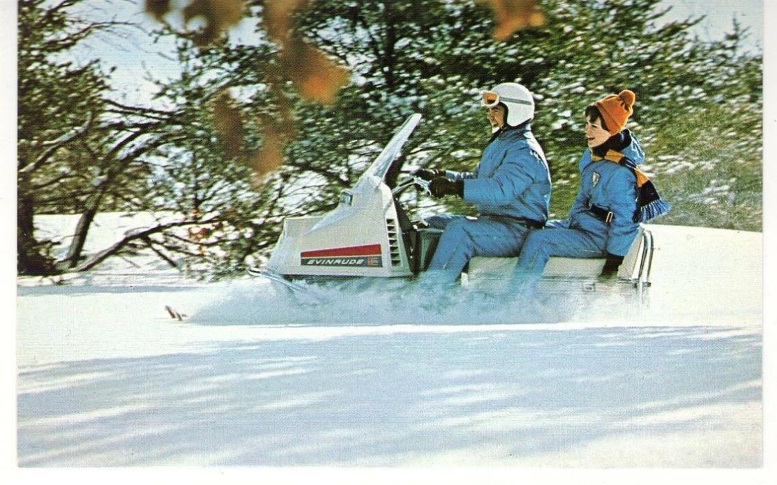 1970'S WINTER SPORT POSTCARD COUPLE ON EVINRUDE SNOWMOBILE