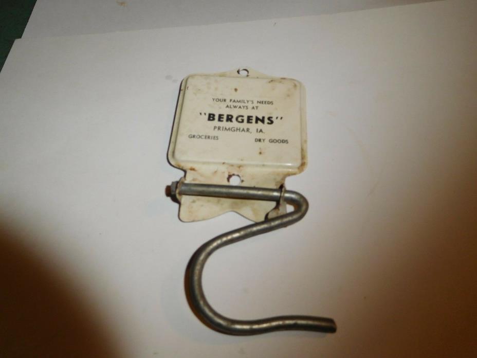 PRIMGHAR, IOWA--BERGINS GORCERY-DRY GOODS-METAL BROOM HOLDER ADV-FOLDS UP