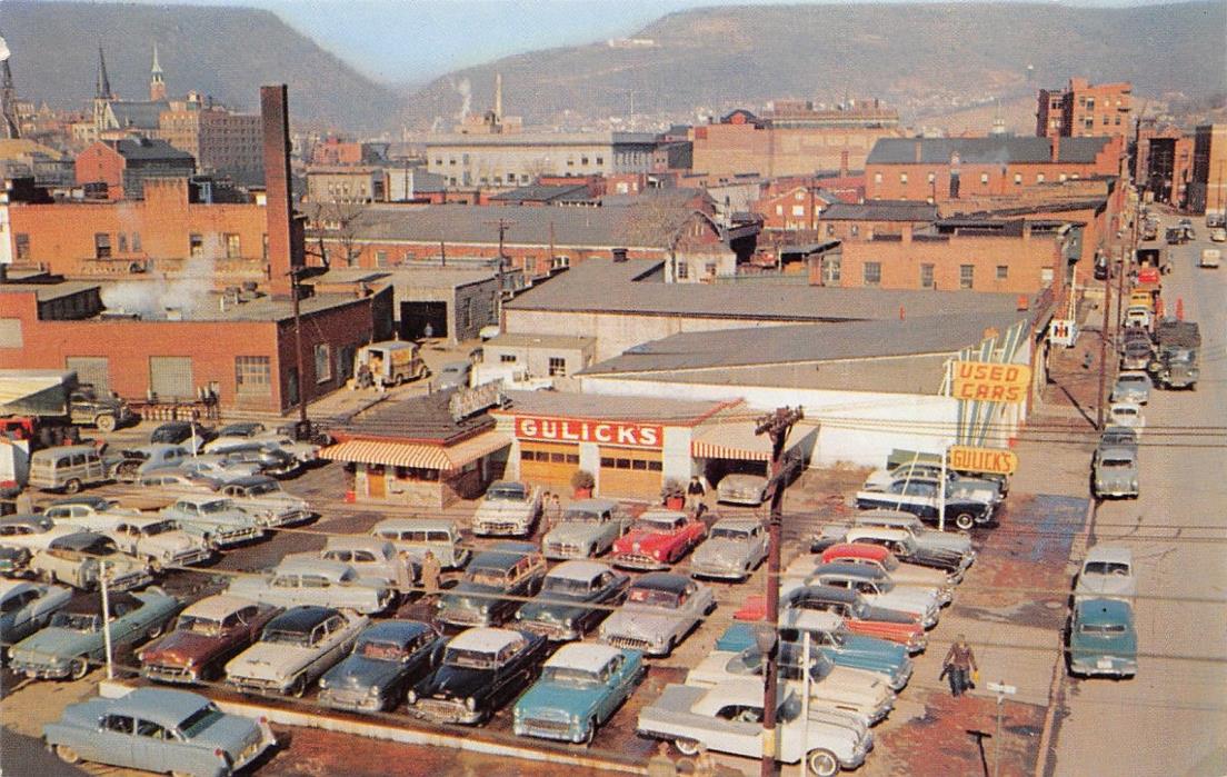 Cumberland MD Gulicks Auto Exchange~1950s~3 Woodies~Used Car Lot~Int'l Harvester