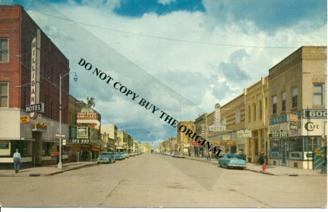 1960 Miles City,Montana Looking East on Main from 6th & Main unu post card NOS