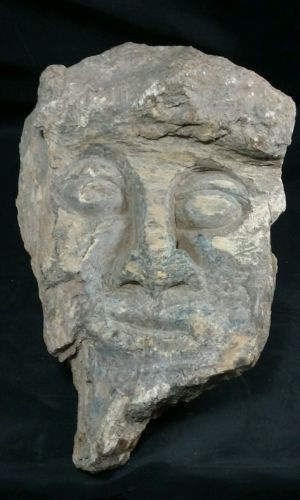 Petrified Wood Carving - Island of Sumatra.  Indonesian warrior face 11