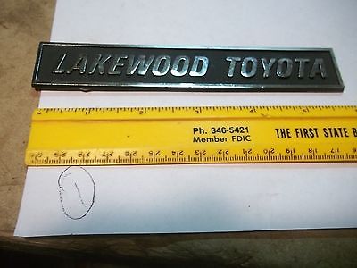 Old Metal Car Dealer Emblem Lakewood Toyota