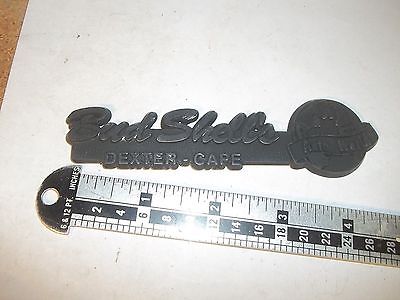 Old Car Dealer Emblem Bud Shell's Dexter Cape