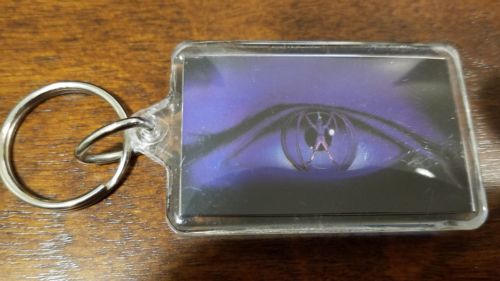 The Lawnmower Man promo key chain (a)
