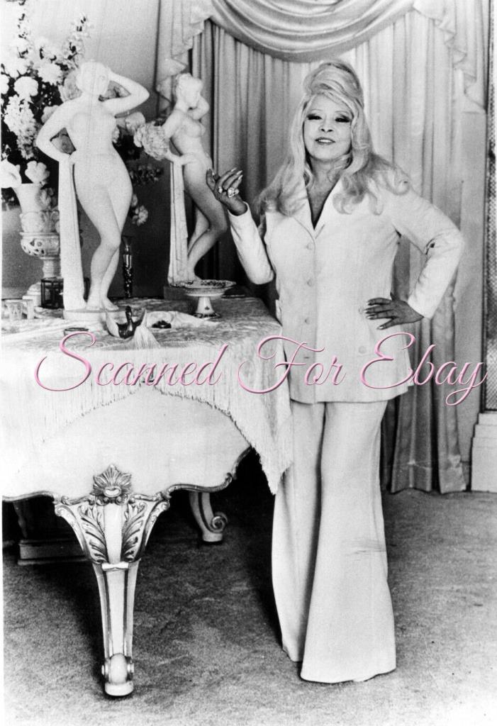 Mae West photo 1970's at home with both of her beloved statues 1975