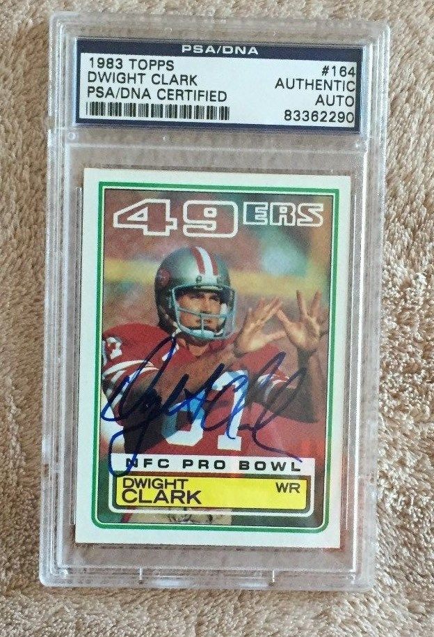 DWIGHT CLARK-49ERS-PSA/DNA AUTO 1983 TOPPS FOOTBALL CARD-SLABBED-DECEASED
