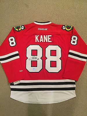 PATRICK KANE SIGNED CHICAGO BLACKHAWKS REEBOK PREMIER JERSEY COA /  FRAMEWORTH