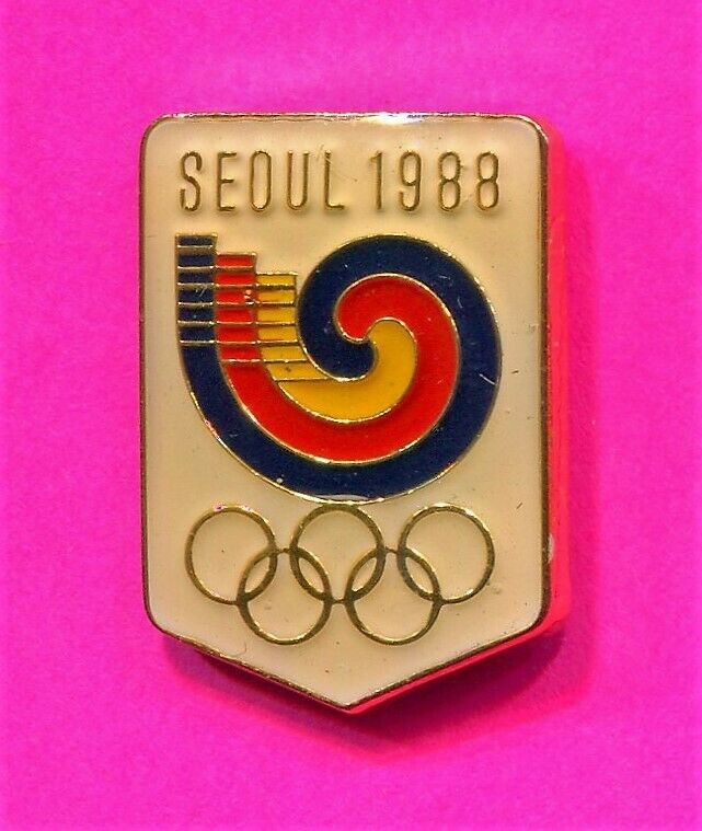 1988 OLYMPIC PIN SEOUL OLYMPIC PIN SHIELD WITH GOLD OLYMPIC RINGS PIN