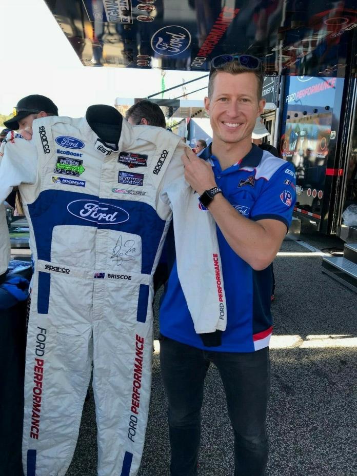 RYAN BRISCOE RACE USED/WORN ,HAND SIGNED, DRIVERS SUIT, FORD GT GANASSI RACING