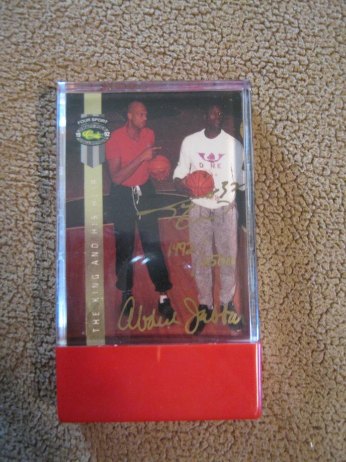 Autographed sport card of Shaquille O'Neal and Abjul Jabbar