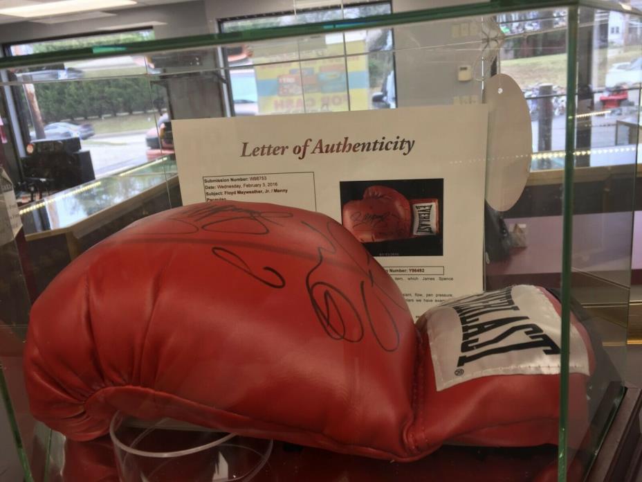 Floyd Mayweather and Manny Pacquiao signed boxing glove