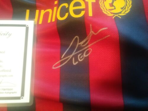 Lionel Messi Autographed Barcelona Jersey.