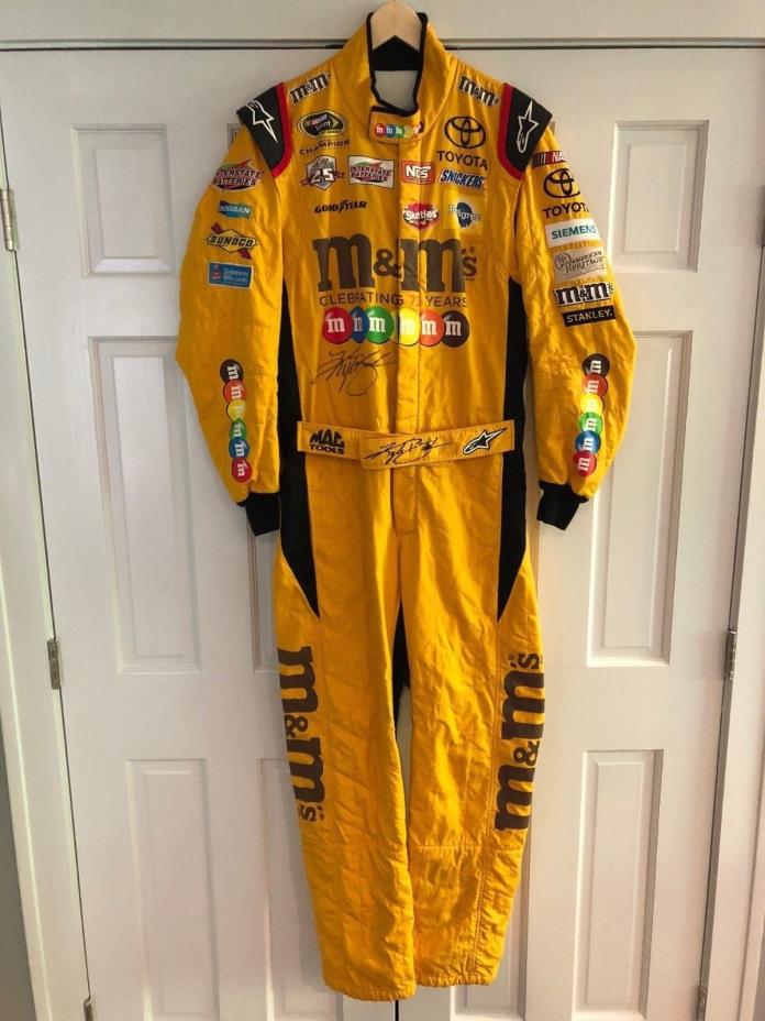 KYLE BUSCH, 2016 JOE GIBBS RACING, M&M SIGNED  RACE WORN/USED DRIVER  SUIT