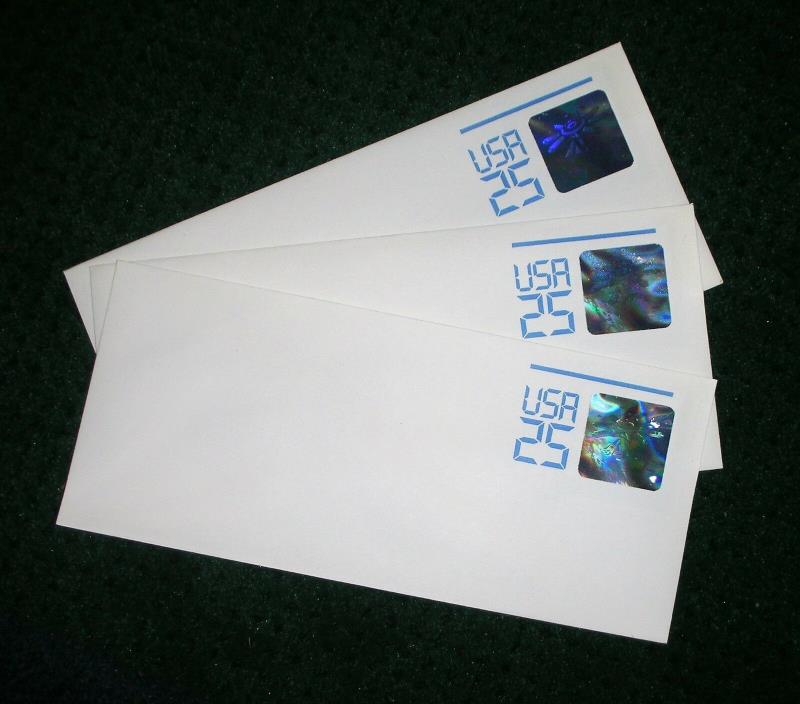 Three complete mint U617 hologram envelopes.  Shuttle Docking w/ Space Station.