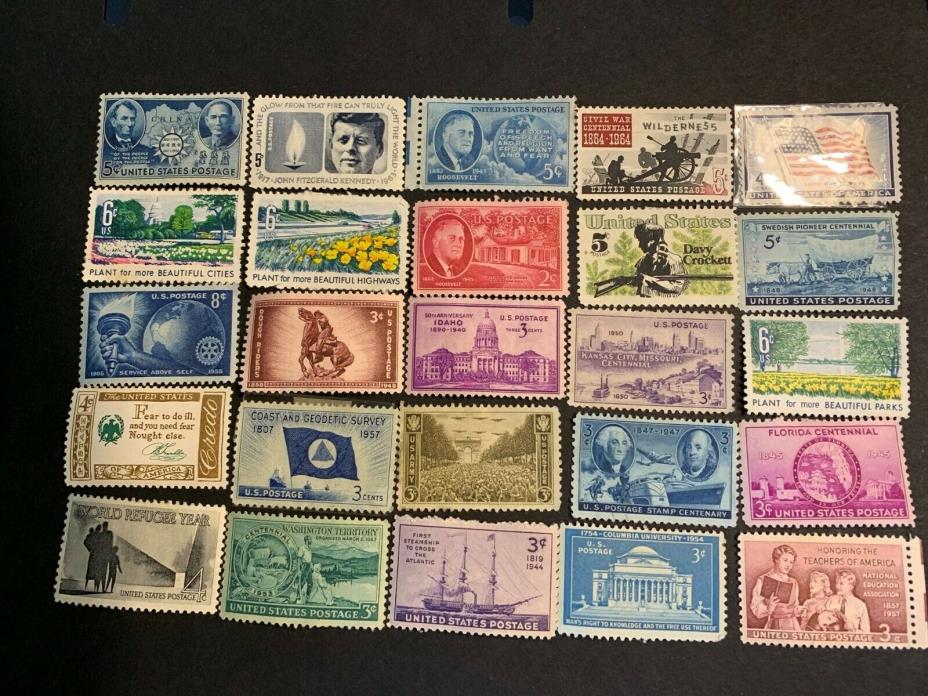 US postage stamps with various dates and amounts unused .