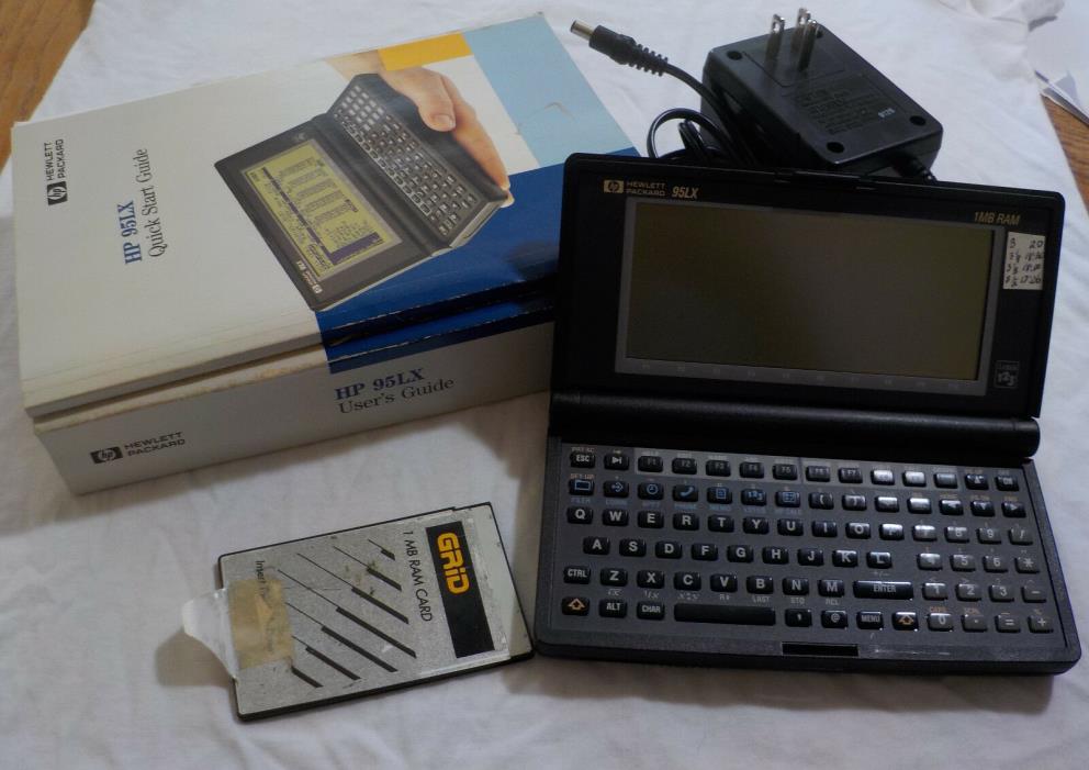 Hewlett Packard HP 95LX 1MB, with 1MB PCMCIA SRAM card, AC adapter, and manuals