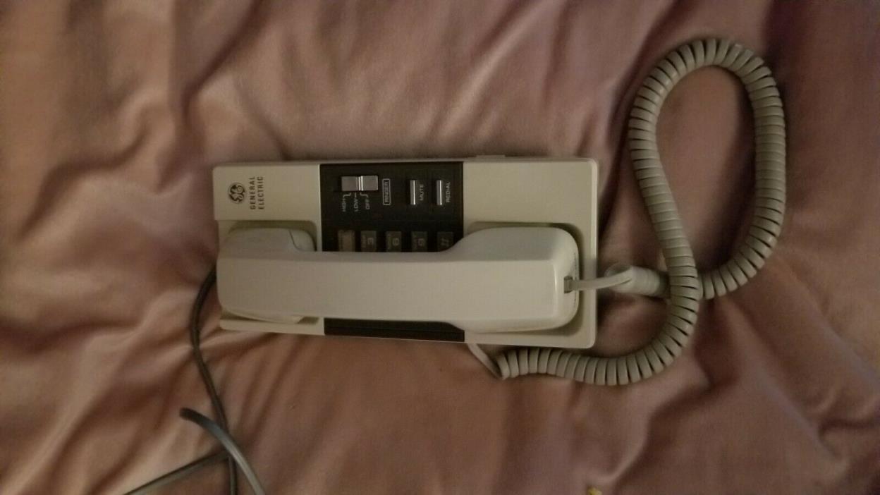 General Electric Phone with ringer volume, redial, and wall mount