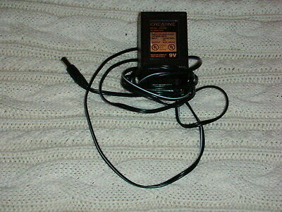 CREATIVE MODEL DV9440 AC ADAPTER IN: 120VAC 60HZ 7W OUT: 9VAC 400mA CLASS 2