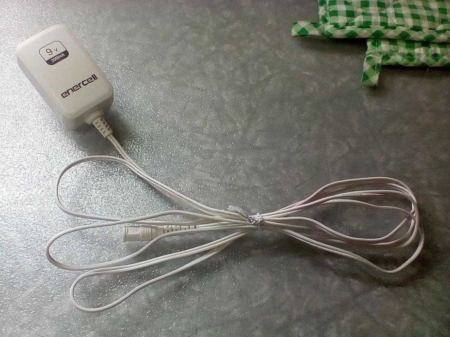 Enercell ac adapter. 9 volt, 300ma.