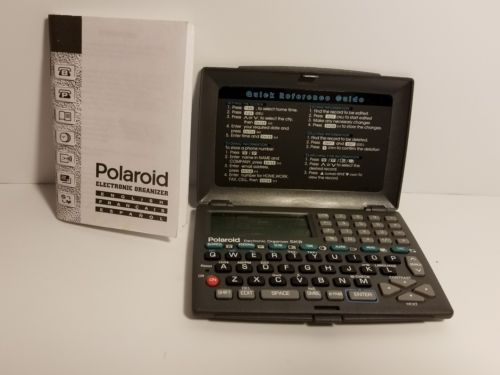 Polaroid Electronic Organizer with Battery & Instruction Manual