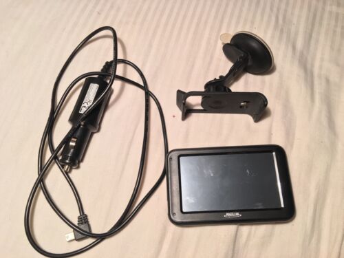 Magellan RM2230T-LM GPS Receiver With Car A/c Adapter And Dashboard Mount Bundle