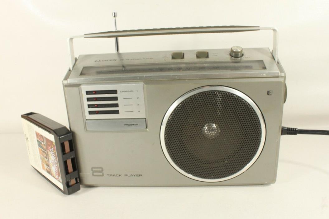 Lloyd's V 155, AM/FM radio with 8 track player.(ref B 490)