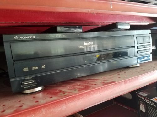 Pioneer CLD-980 Laserdisc Player with free movie disc bundled with remote. Used.