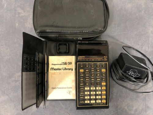 Texas Instruments TI-58 calculator with lots of extras