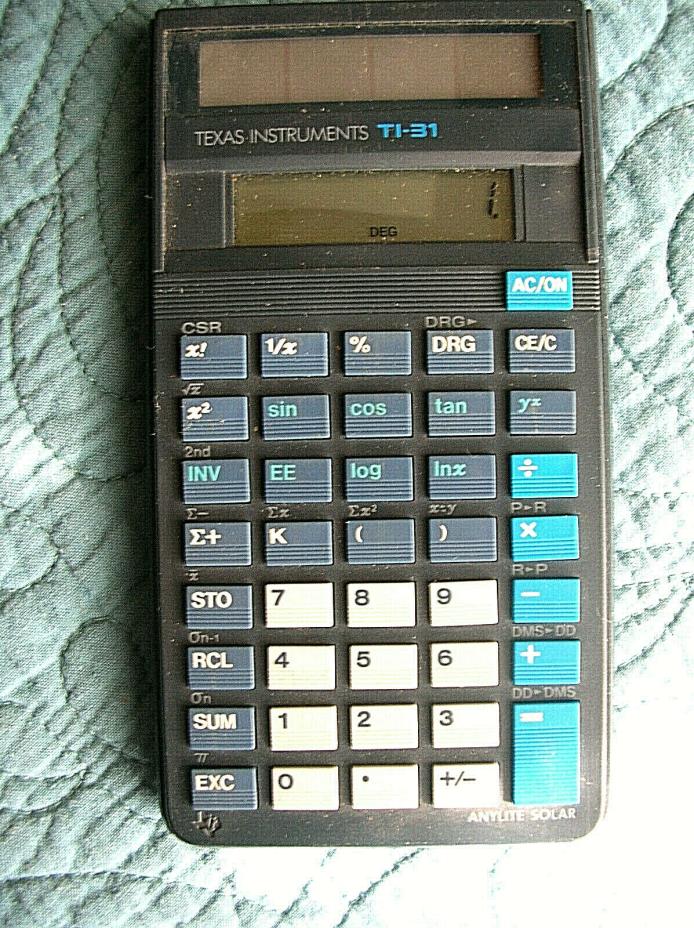 Two Texas Instrument calculators, Ti-31 and Ti-1006.