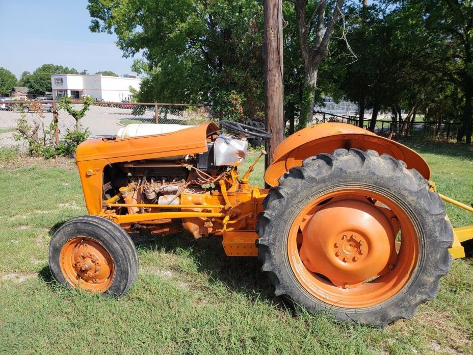 Antique Tractor, yellow, runs with propane, has garden plow, brush hog and blade