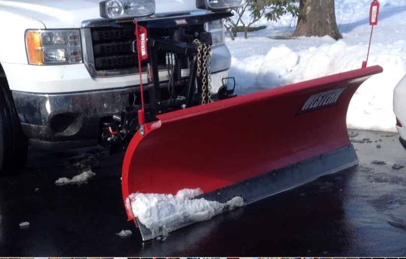 8 feet snow plow and spreader good condition storage keep ,harness include