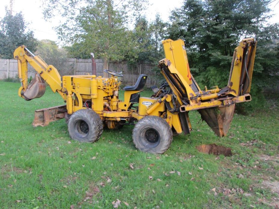 tree spade 4x4 articulated with backhoe