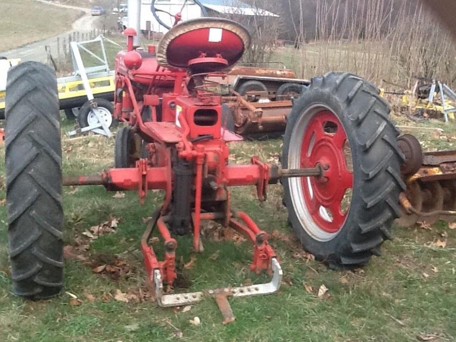 farmall c tractor with plow