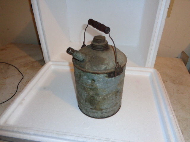 antique 1 gallon Nesco gasoline can w/ wooden handle