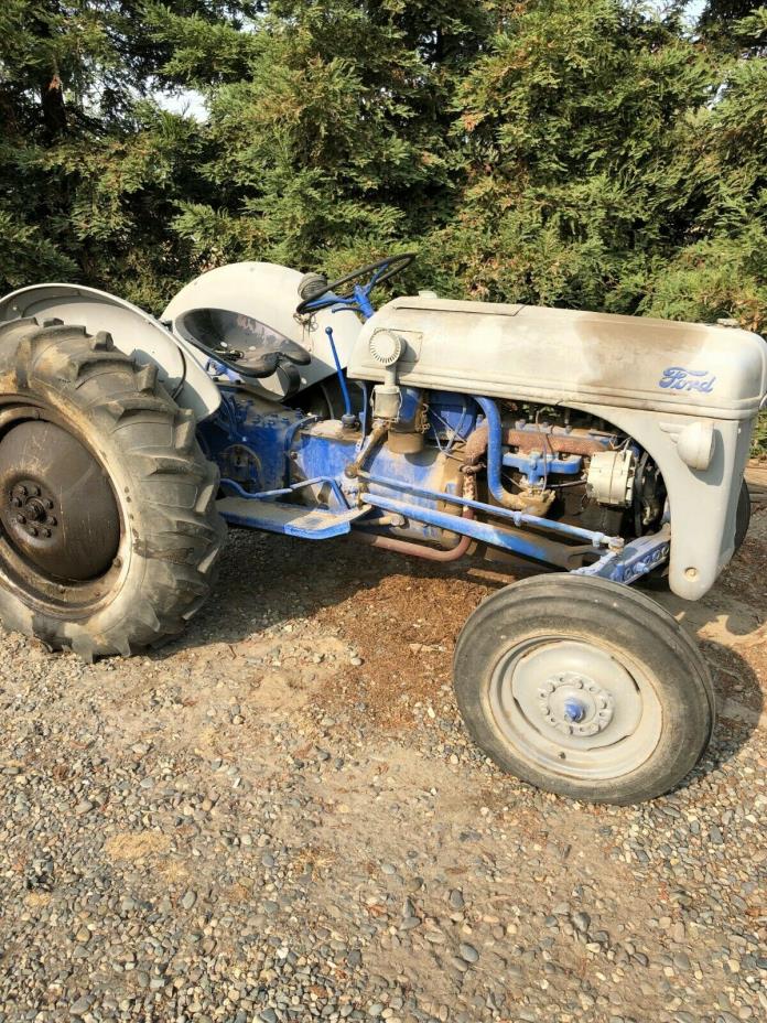 Old Ford Tractor, 1940's model,  runs great comes with 4 attachments