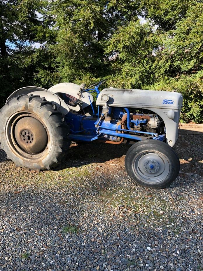 1940’s Ford Tractor with disc, box scraper, ridger, and chain drag