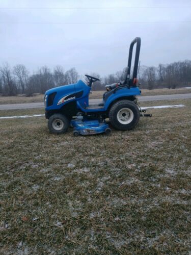 Very Clean New Holland TC25D Tractor w/belly mower CAN SHIP CHEAP
