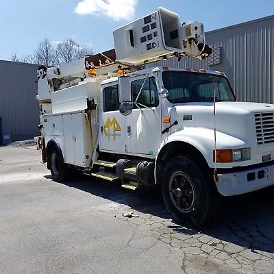 International bucket truck 4900 DT466e 4 door with a 28000 pound winch in bed