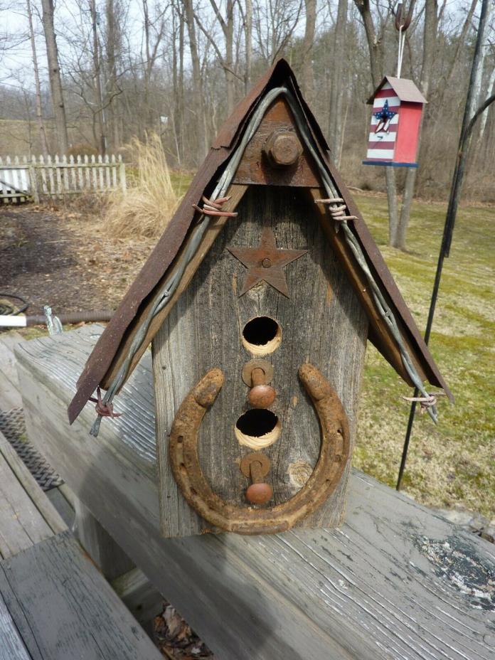 Handmade Rustic Bird House made from old barn wood with tin roof and barbed wire