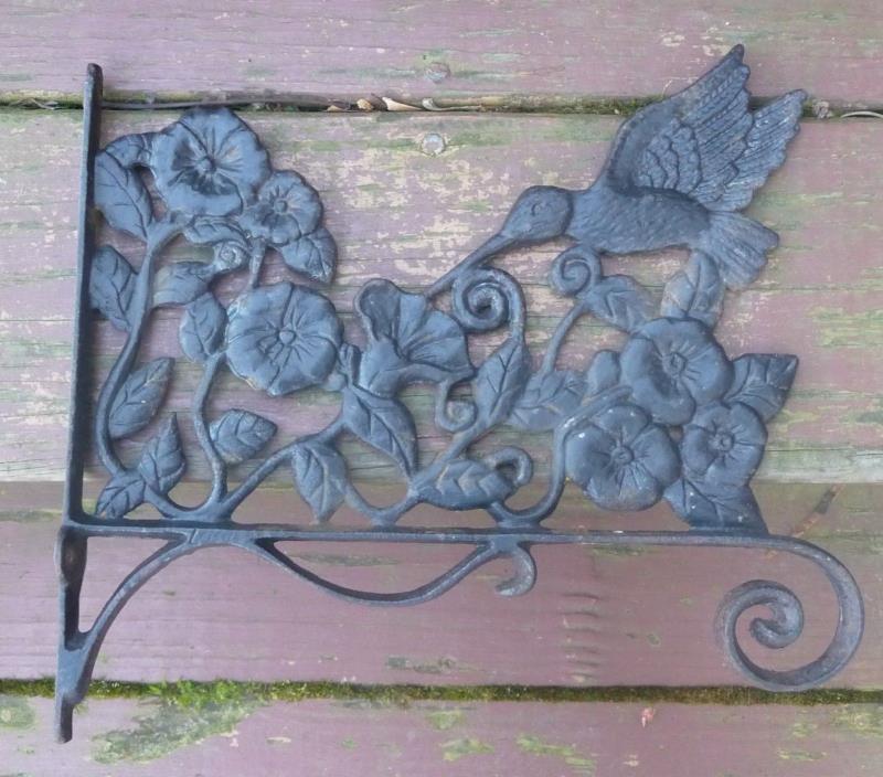 Cast iron hummingbird themed wall mount flower pot hanger