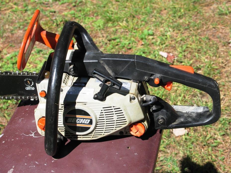 Echo CS-3450 Chainsaw. Needs TLC. Sat for awhile.
