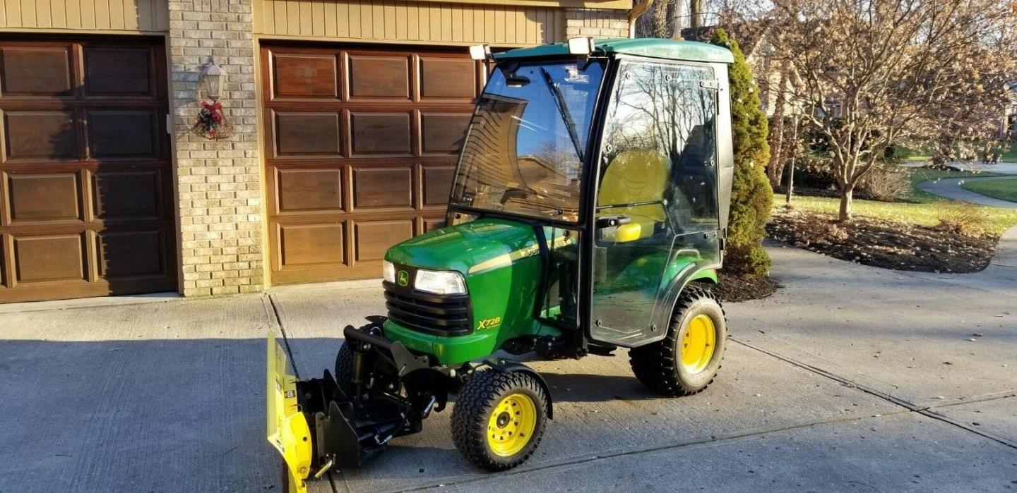 John Deere x 728 Lawn Tractor, heated Cozy cab, hydraulic snow blade, mower,