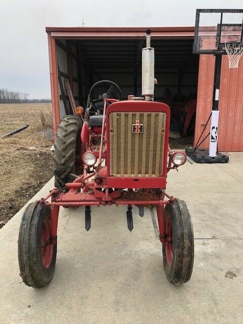 Farmall 140 Tractor Hi-Clear with IH 144 Cultivator and Side Dresser