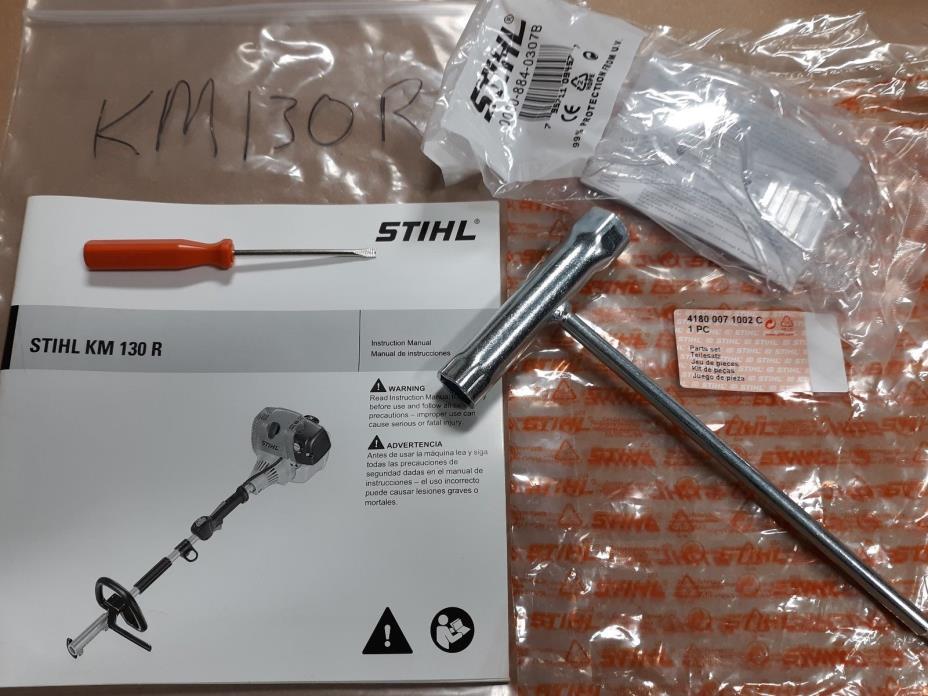 NOS Stihl KM 130R Kombi UNIT Operators Manual with tools and safety glasses