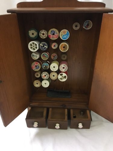 VINTAGE WOOD WALL MOUNT SPOOL CABINET WITH DRAWERS