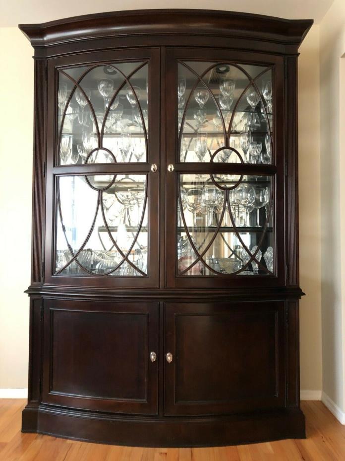Raymour and Flanigan china cabinet in espresso wood with silver pulls