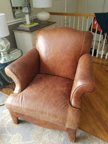 Brown leather club chair