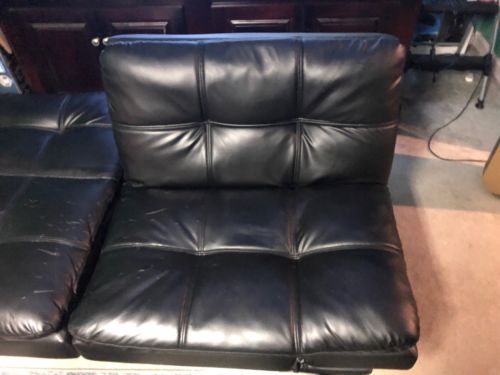 Two Faux Leather Futons