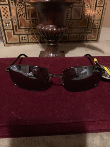 Foster Grant ETERNAL POL 71 Polarized Sunglasses Brown Metal 100’/, UVA/UVB