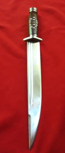Quality Fighting Knife with Massive 10 Inch Blade, and Hard Sheath.